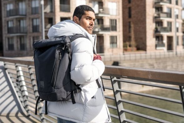 Rear view of a man with a backpack